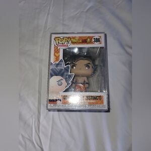 Funko Pop Animation Goku Ultra Instinct Figure with Black and Gray Hair